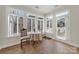 Bright breakfast nook with large windows and access to the backyard. Features tiled floors at 2959 Bellasera Way, Matthews, NC 28105