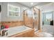 Bathroom featuring a soaking tub and separate shower at 3020 Fallondale Rd, Waxhaw, NC 28173