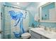 Bathroom featuring blue walls, a shower with a mermaid shower curtain, and a white vanity at 3020 Fallondale Rd, Waxhaw, NC 28173
