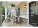 Inviting front porch with comfortable seating, perfect for relaxing and enjoying the outdoors at 3020 Fallondale Rd, Waxhaw, NC 28173