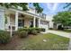 Inviting front porch with comfortable seating, perfect for relaxing and enjoying the outdoors at 3020 Fallondale Rd, Waxhaw, NC 28173