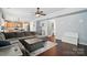 Spacious living room with hardwood floors and cozy furnishings at 3020 Fallondale Rd, Waxhaw, NC 28173