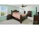 Well-lit bedroom with a ceiling fan and an organized closet at 3020 Fallondale Rd, Waxhaw, NC 28173