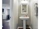 Powder room featuring elegant pedestal sink at 3020 Fallondale Rd, Waxhaw, NC 28173