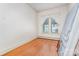 Bedroom with hardwood floors and window, features white walls and trim at 330 S Ellis St, Salisbury, NC 28144