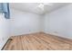 Empty bedroom featuring laminate floors and white walls, with a ceiling fan at 330 S Ellis St, Salisbury, NC 28144