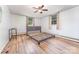 Bright bedroom with hardwood floors, natural light from windows, and neutral wall color at 330 S Ellis St, Salisbury, NC 28144