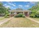 Classic brick home with a spacious front porch and beautifully maintained yard at 330 S Ellis St, Salisbury, NC 28144