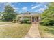 Attractive brick home with a wide front porch, showcasing its curb appeal at 330 S Ellis St, Salisbury, NC 28144