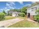 Charming home exterior with a detached garage, driveway and well-maintained lawn at 330 S Ellis St, Salisbury, NC 28144