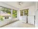 Well-lit laundry room featuring multiple windows, washer and dryer hookups at 330 S Ellis St, Salisbury, NC 28144