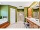 Bathroom with a large tub, walk-in shower and double sink vanity at 3381 Elaine Ave, Lincolnton, NC 28092