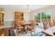 Traditional dining room features wooden furniture, a hutch, and sliding glass doors at 3381 Elaine Ave, Lincolnton, NC 28092