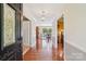Inviting home foyer with hardwood floors and view to dining room, showcasing its elegant design at 3381 Elaine Ave, Lincolnton, NC 28092