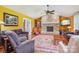 Cozy living room featuring a stone fireplace, hardwood floors, and comfortable seating at 3381 Elaine Ave, Lincolnton, NC 28092