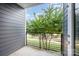 Cozy balcony with black metal railing and a view of the lush green outdoors at 3643 Vallette Ct, Charlotte, NC 28203