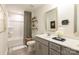 Bright bathroom with tile floors, gray vanity with double sinks, and shower-tub combo at 4715 Formation Dr # 047, Lancaster, SC 29720