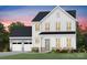 New construction featuring a white facade, black roof, attached garage, and inviting landscaping at 4715 Formation Dr # 047, Lancaster, SC 29720