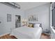 Cozy bedroom with a comfortable bed, ample natural light, and modern decor at 514 W 10Th St # 302, Charlotte, NC 28202
