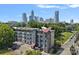 Wonderful exterior view of a modern apartment building with city skyline in background at 514 W 10Th St # 302, Charlotte, NC 28202
