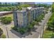 Modern apartment building with sleek architecture, bright accents, and landscaped surroundings for urban living at 514 W 10Th St # 302, Charlotte, NC 28202