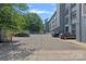 Well-maintained parking area behind an apartment building, providing convenience and security for residents and guests at 514 W 10Th St # 302, Charlotte, NC 28202