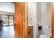 Half bathroom featuring oak cabinets, ceramic tile floor, and updated fixtures at 544 Hicks Creek Rd, Troutman, NC 28166
