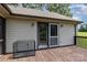 Spacious outdoor deck featuring a dog crate, offering a secure space with natural light and backyard views at 544 Hicks Creek Rd, Troutman, NC 28166