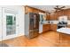Spacious kitchen with stainless steel refrigerator and a door to the outside at 544 Hicks Creek Rd, Troutman, NC 28166
