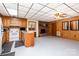 Spacious kitchen with a brick fireplace, white appliances, and a tiled ceiling at 544 Hicks Creek Rd, Troutman, NC 28166