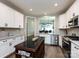Elegant kitchen with stainless steel appliances, granite countertops, and a functional kitchen island at 7337 Overjoyed Xing, Charlotte, NC 28215