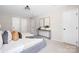 Spacious main bedroom with carpeting, natural light, and minimalist decor at 7407 Limerick Dr, Charlotte, NC 28270
