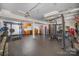 Spacious home gym featuring a variety of weight-lifting equipment and custom storage cabinets at 7434 Lawyers Station Dr, Mint Hill, NC 28227