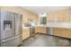 Well-lit kitchen with stainless steel appliances and tile floors at 7434 Lawyers Station Dr, Mint Hill, NC 28227
