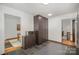 Spacious kitchen featuring slate floors, stainless steel microwave and ample cabinet storage at 7434 Lawyers Station Dr, Mint Hill, NC 28227