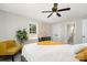 Beautiful main bedroom featuring a plush bed, dark wood dresser, ensuite bathroom, and natural light at 8208 Doverdale Ln, Charlotte, NC 28217