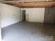 Unfinished basement with exposed ceiling at 8417 Rolling Hills Ave, Hickory, NC 28602