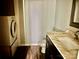 Bathroom with laundry area, modern vanity, and sink at 8417 Rolling Hills Ave, Hickory, NC 28602