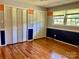 Bedroom with hardwood floors, unique paint and multiple closets at 8417 Rolling Hills Ave, Hickory, NC 28602