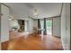Bright dining area with direct access to a spacious living room and outdoor patio at 10435 Silver Mine Rd, Fort Mill, SC 29707