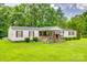 Charming single-story home with a well-manicured lawn and welcoming front porch at 10435 Silver Mine Rd, Fort Mill, SC 29707