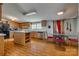 Functional kitchen layout with island, stainless steel appliances, and adjacent dining space at 10435 Silver Mine Rd, Fort Mill, SC 29707