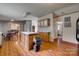 Open kitchen area includes wood cabinets and an island with seating space at 10435 Silver Mine Rd, Fort Mill, SC 29707