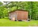 Exterior view of a shed with brown walls, double doors, window and ramp entrance at 10435 Silver Mine Rd, Fort Mill, SC 29707