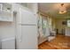 Cozy living area with bench seating, hardwood floors, and abundant natural light at 1239 Mac Ln, Stanley, NC 28164