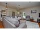 Well-lit living room with a neutral color palette, comfortable seating and an open layout at 1239 Mac Ln, Stanley, NC 28164