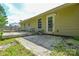 Exterior view of the backyard, showcasing a wooden deck, patio area and lawn at 1312 Shenandoah Cir, Rock Hill, SC 29730