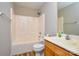 Bathroom with a shower and tub and a wood vanity with a sink at 1312 Shenandoah Cir, Rock Hill, SC 29730
