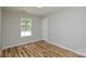 Bright bedroom featuring modern flooring and trim with neutral paint and natural light at 1312 Shenandoah Cir, Rock Hill, SC 29730