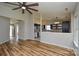 Open concept living room with hardwood flooring, view of the kitchen and natural light at 1312 Shenandoah Cir, Rock Hill, SC 29730